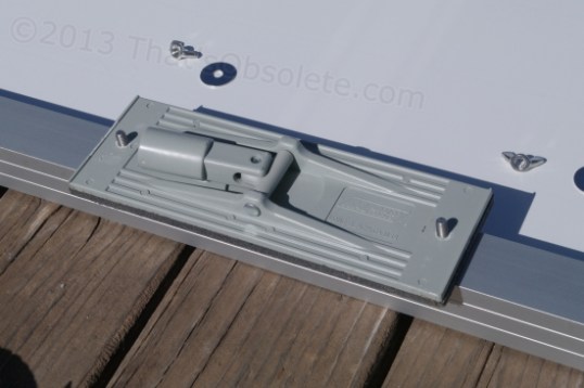 This is the pad as we originally installed it - in a big hurry. The 45-pound panel rests on that protruding edge, which is a lot of weight. Not good.