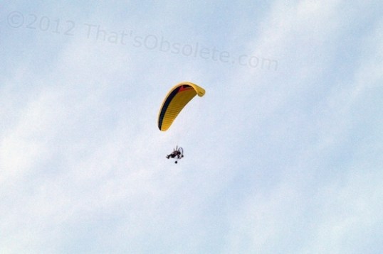 Engine wailing, this little craft worked its way through the sky.