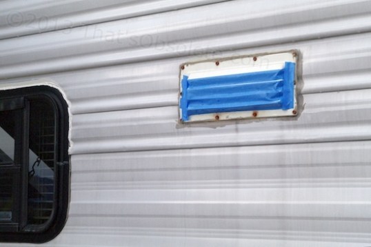 Crass, but blue painter's tape works well to seal the cooking exhaust fan vent, as long as I pull it off within a few days.