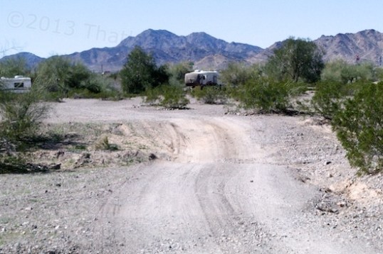 This is a good reason why selecting an RV type and configuration can be far more important than selecting an RV brand or model. Technically I might be able to get my older 26" travel trailer through this shallow dip, but not without some serious frame dragging in 4WD-low range. Might need a shovel, too.