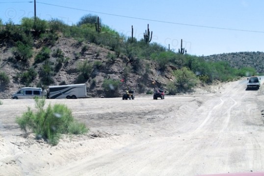 Uh-oh. Tow vehicle looks low, and there's a tow truck.