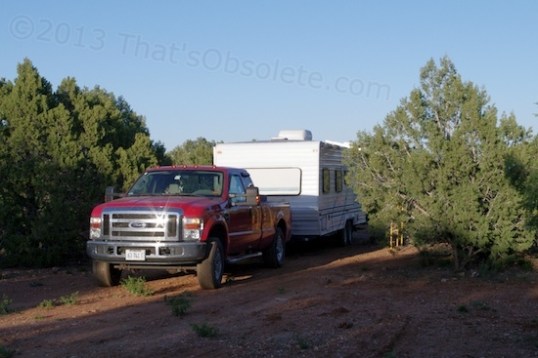 Despite itʼs size, you can still wedge it in between the trees and deploy the solar panels just fine.