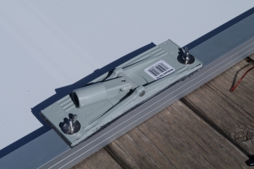 This Home Depot sanding pad, cut, re-driiled and remounted, now fits flush.