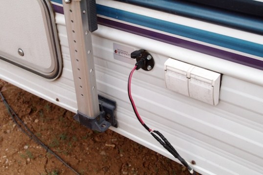The solar power connector leading to the battery storage area under the bunkbed, to power the system for the CPAP device.