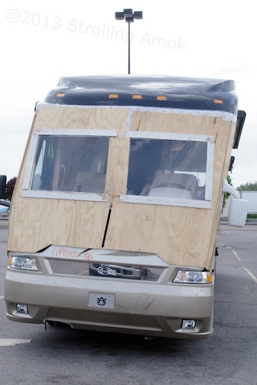 Just in case you're not sure, what's wrong with this picture of this uber-buck, high-end motorhome? Yes! It's bent and the front end is now plywood and plexi.