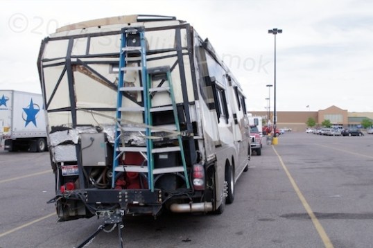 According to the Walmart security guy, this couple is returning to Iowa to see if this can be fixed. My guess: get it back to the factory and let them strip everything to the bare frame, then start over.
