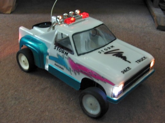 With lights and strobes flashing, this pace vehicle has a history - one that nobody gives a hoot about.