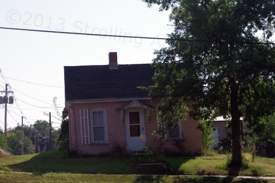 This tiny brick home on the outskirts of town (a few hundred yards from the square) looks like its foundation is listing heavily to port, because it is. But notice how straight the roof's peak remains? I saw no other run-down or distressed houses in town. This is it. 