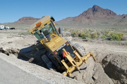 It really is quite a tilt, and with the belly pan and blade grounded, it'll be a challenge to get it out.