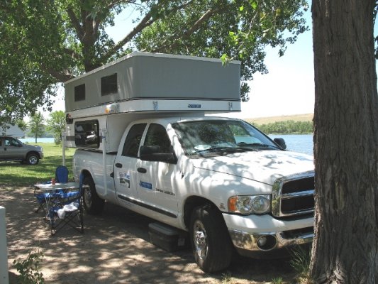 The same model with roof raised up offers full-height stand-up camping.