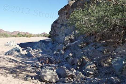 Tyson's Wash is like the Mississippi in a heavy rain, only not as slow. These rocks were buried in sand two years ago, and became exposed because of turbulence.