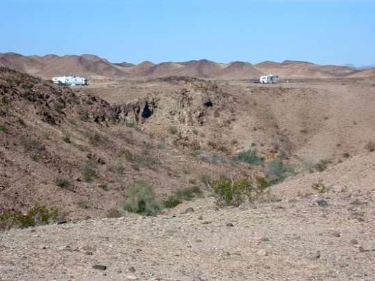 Don't be mislead by all the "vast plains" shots I take. These deep gullies are all over the place here and until you get close, you won't notice they're there.