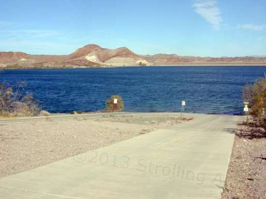 You can't camp overnight at this particular one (of several), but it does have a spectacular boat ramp. Watch your prop though: it gets shallow at points.