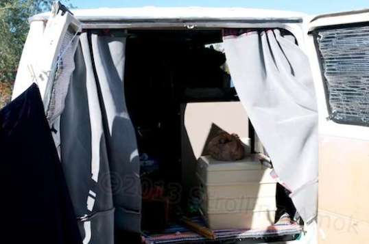 The rear curtain is much like the front one: floor to ceiling and split in the middle.