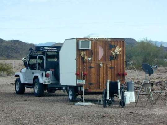 With a combination of practicality, charm, and humor, this little RV apparently gets the job done. I never saw the owner outside to escape the confines.