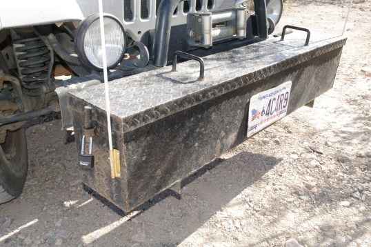 Charles made the toolbox. Its drop-down lid has a pin through ring that can be padlocked on each end.