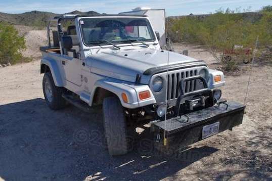 There's a winch, lights, and a toolbox for a front bumper.
