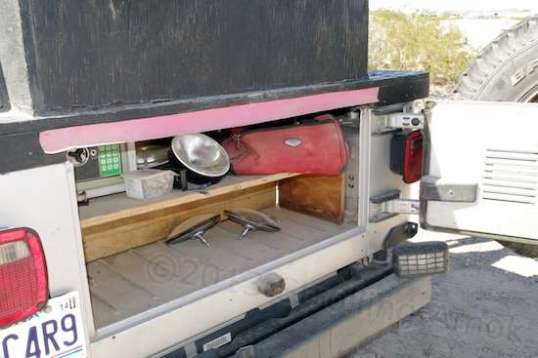 The tailgate makes this a good-sized lockable compartment.