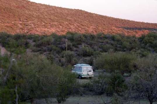 One of the trails leads past a couple of pulloffs that provide nice, level sites. This has got to be a mid-60s Dodge conversion van that overnighted there and on the other trail for a few nights. Nice contrast to the megabuck hardware I'm parked near.