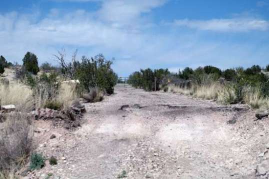 Had I been able to make it, the BLM gate is just ahead. It proved just as well, the south-most mile of the road has a couple of issues for low-clearance vehicles.