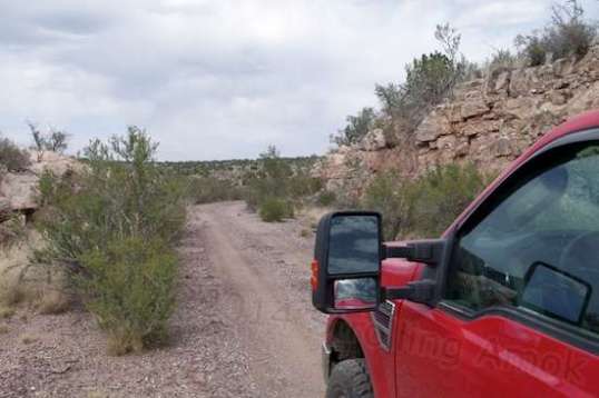 Heading back to the camper shows how the road was hewn out from the hilltop. It allows two lanes, and that's it!