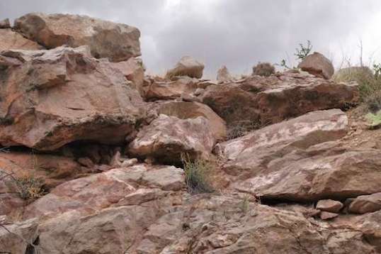 And now for something completely different. The view up from the roadway between the walls of rock!