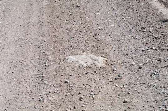 Oh look! A rock! A rock in the road! I guess this is only exciting if you have a thing for abandoned US highways that have disintegrated so badly that the pavement is long gone.