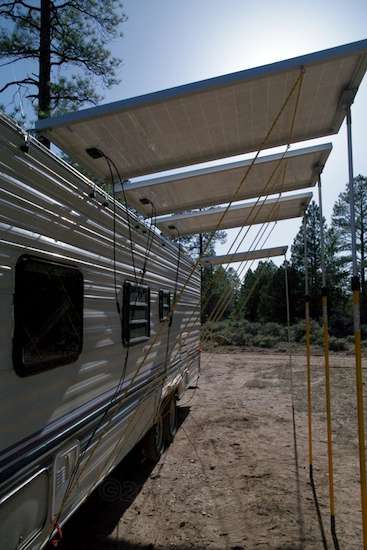 Until the wind decides to shift to come in strongly from the north, panel lift is of no concern. Just raising them this high manually is a bit of trick.