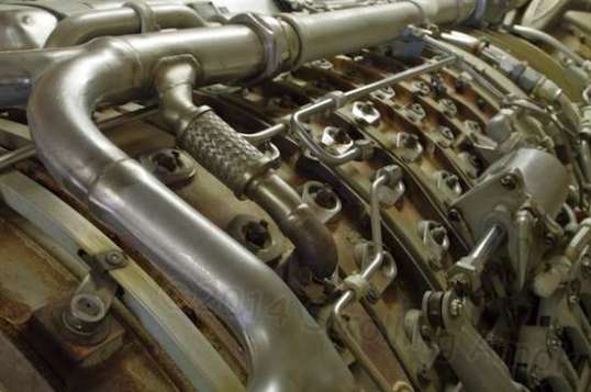 The exterior of a jet engine. That's a lot of plumbing for an oversized weeny roaster.