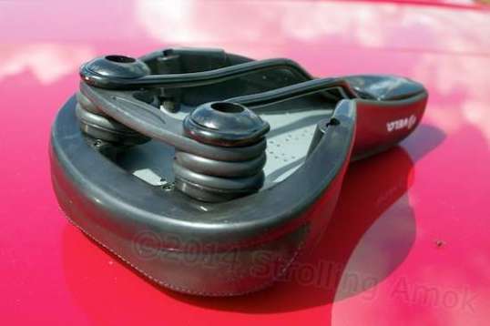 The seat's underside hints at springs, but the stack is incompressible.