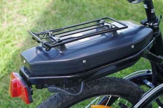Stuffing a big battery directly underneath a rear rack compromises how that rack can be used.