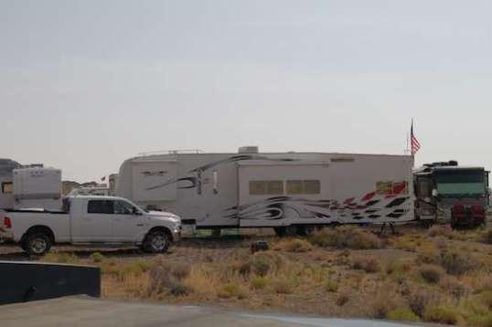 A large rig does not the best boondocker make.  The guy in this huge triple-axle fifth-wheel had to run his generator 24/7 to keep things rolling.