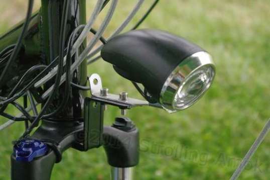 This may not be the most elegant solution, but utilizing the existing fender bracket is the easiest way to get the headlamp back on after the fender is gone.