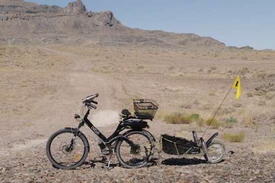 With fenders, rack and basket clipped on, it can run solo on errands, or use the trailer to safely carry photo/video equipment and a lawn chair to local events.