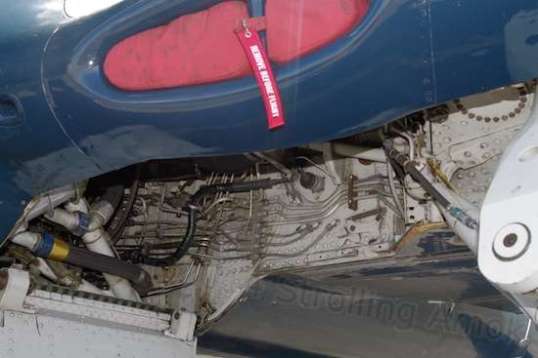 The F8F's landing gear bay. Just a reminder that beneath the pretty skin is a heap of machinery packed in every nook and cranny. The early press didn't call them "flying machines" for nothing.