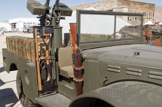 Just to prove my point, a rifle, pickaxe and shovel are carefully stowed in places with nice leather belts, ready for use.