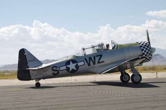 On the ground, the Texan's pilot gives the crowd an up-close look.