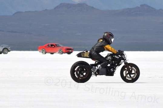 Hey, it's a girl! I only knew thanks to the announcer and my telephoto lens. She did well on this weird-looking tiddler, and looked like she was having fun trying to stretch it out. Women drivers are not uncommon at Bonneville, from bikes to streamliners.