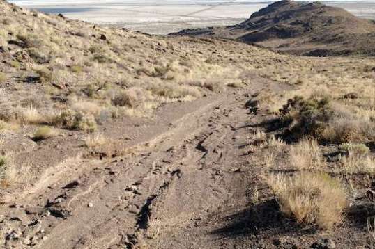 Rotten trail, nice view downhill. Drop a tire into a sandy gully, and you'll never get out.