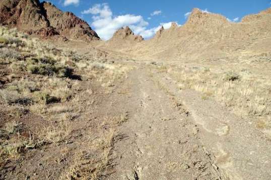 I had to stop and give it up here, because I was walking again, and the trail ahead was so chopped up that there was no path to pick. Even the "good" center was choppy, steering was ineffective, and traction was still on the edge.