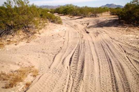 This whole area is a wash, actually, and this is the overflow part of it. The sand and dust frequently gets thick enough to cause steering loss and a "dig in".