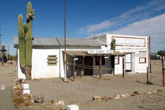The building next to it is presumably part of the same listing, and is in better shape.