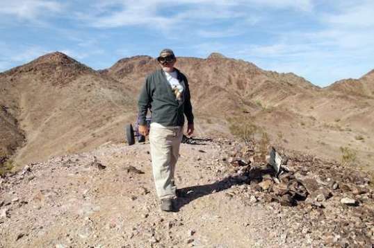 We paused to examine the downslope of one hilltop, as Delmont does his Master of His Domain pose while taking in the vista ahead.