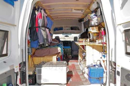 Notice the Engel fridge-freezer and fold-down counter opposite. This works, and without pain.