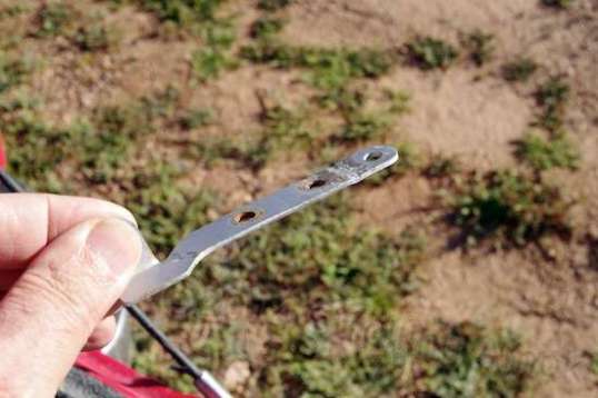 Umm, the elbow was flattened by using a ball peen hammer and a big flat rock. Not pretty, but good enough for who it's for.