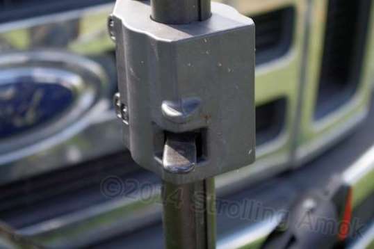 Lift that lever and the hook slides up or down without any fooling around. Bang.