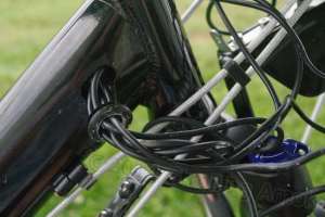 Gently pry out the gasket to be able to GENTLY pull more wire lengths out.