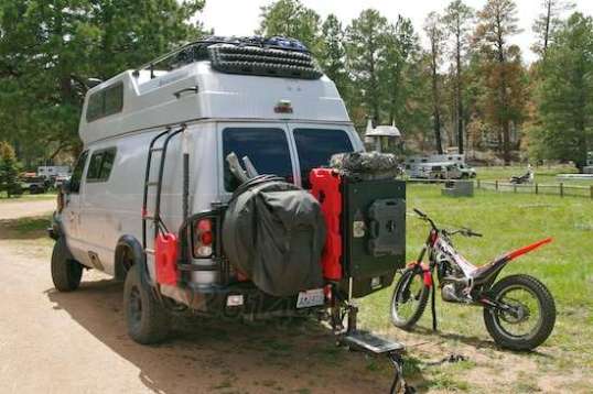 Here's a High Top version of Sportsmobile, carrying even more crap.