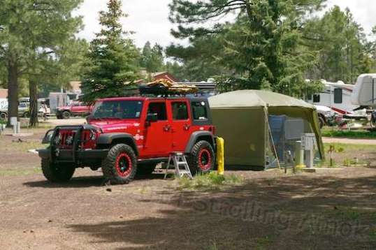 Back in camp, one guy got his sleeping/lounging/office area just the way he wanted it. The tent was amazingly full, and how he jams it into the Jeep is a mystery to me.