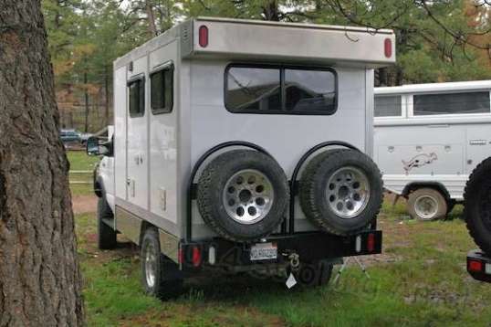 Mounted on a flatbed, interior space becomes more abundant. But you have to be mighty well-breakfasted to heft one of those spare tires up onto its mount.
